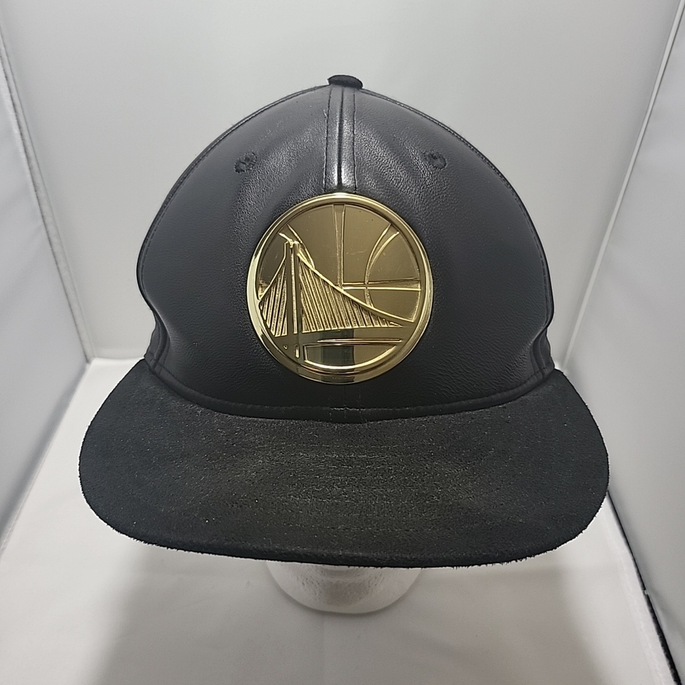 New Era Golden State Warriors 9FIFTY Black Gold Metal Logo Strapback Hat